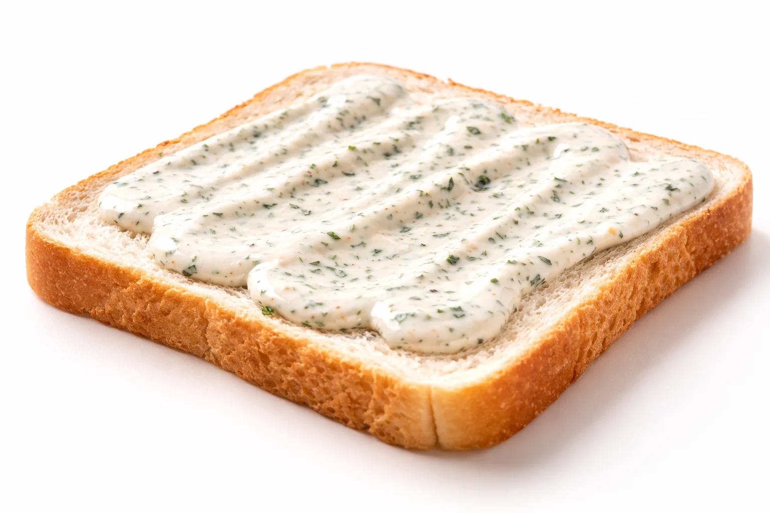 Ranch dressing spread on slider buns for Buffalo Chicken Sliders assembly