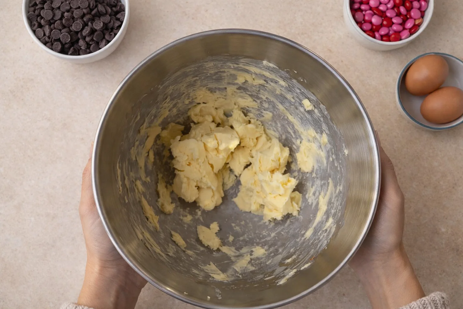 Cold butter creamed until smooth in a stainless steel mixing bowl