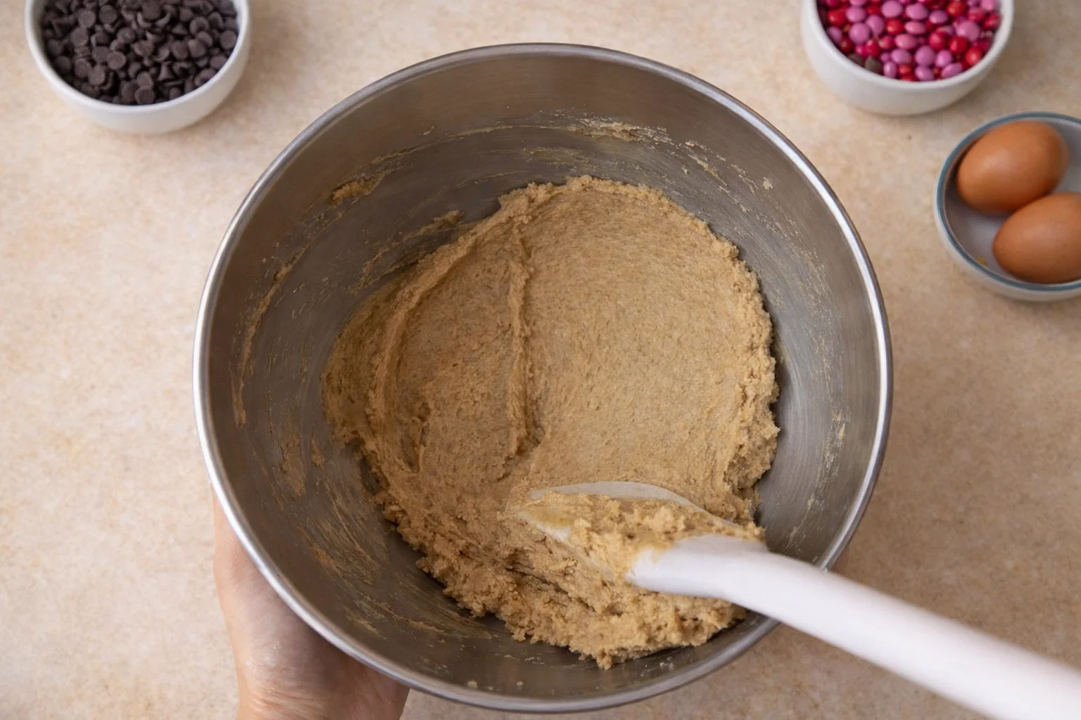 Cookie dough after eggs and vanilla are fully incorporated