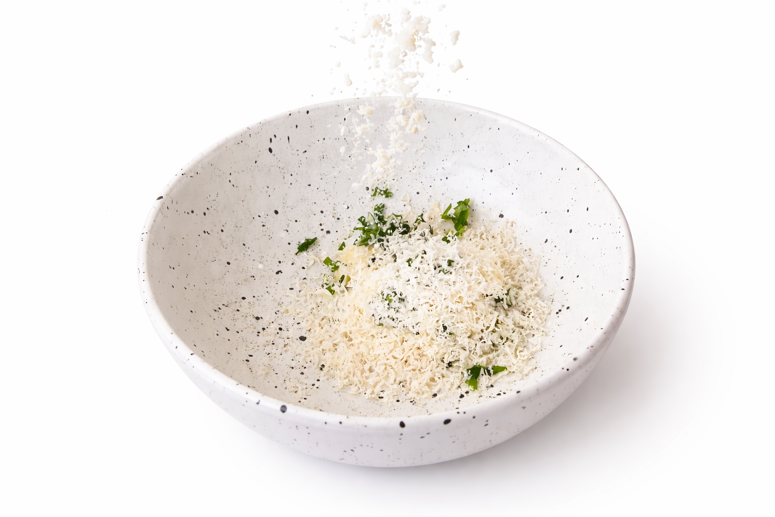 Fresh grated parmesan cheese with chopped parsley in a bowl