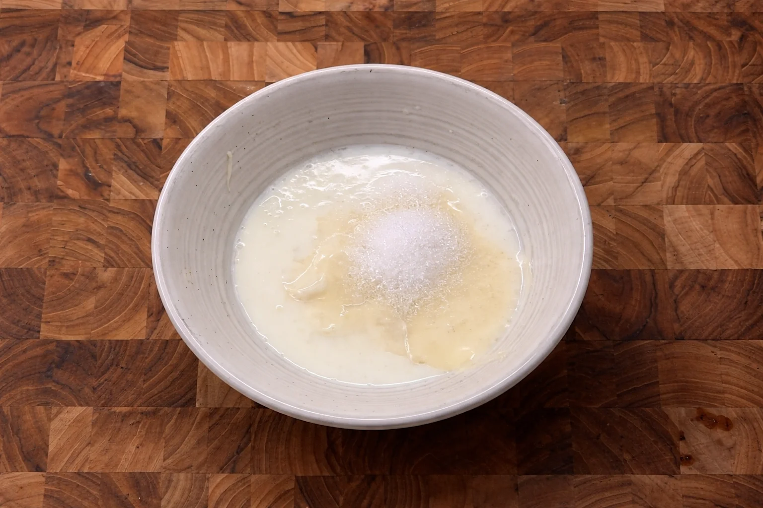 Sweet and spicy garlic chili sauce simmering in skillet