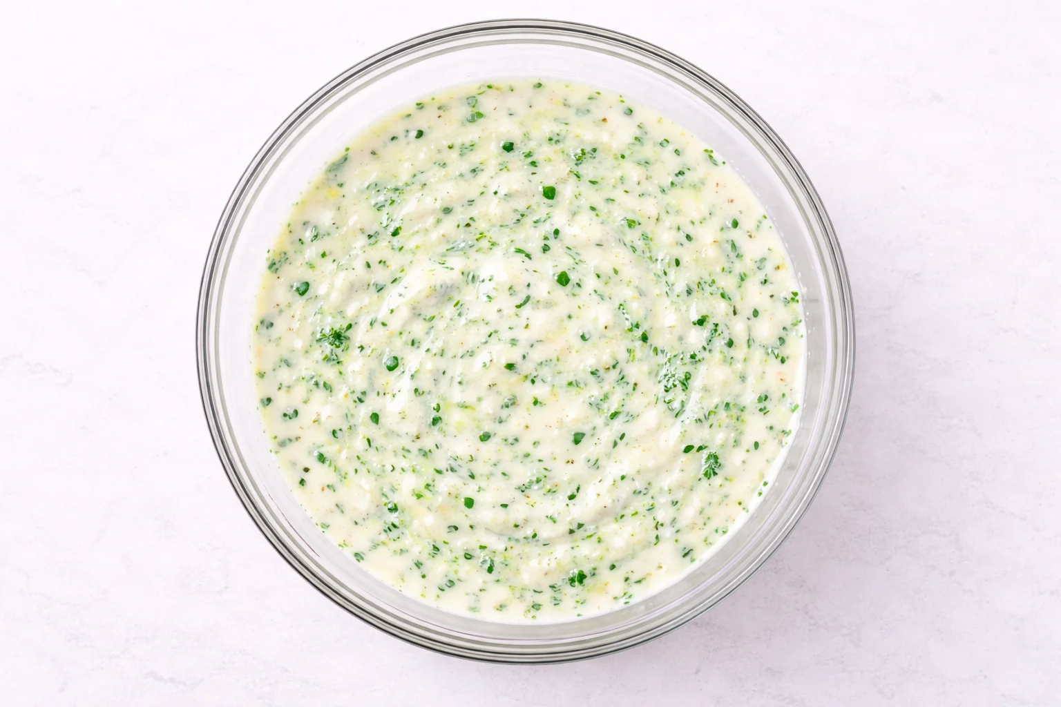 Garlic butter brushed over slider buns before baking Buffalo Chicken Sliders