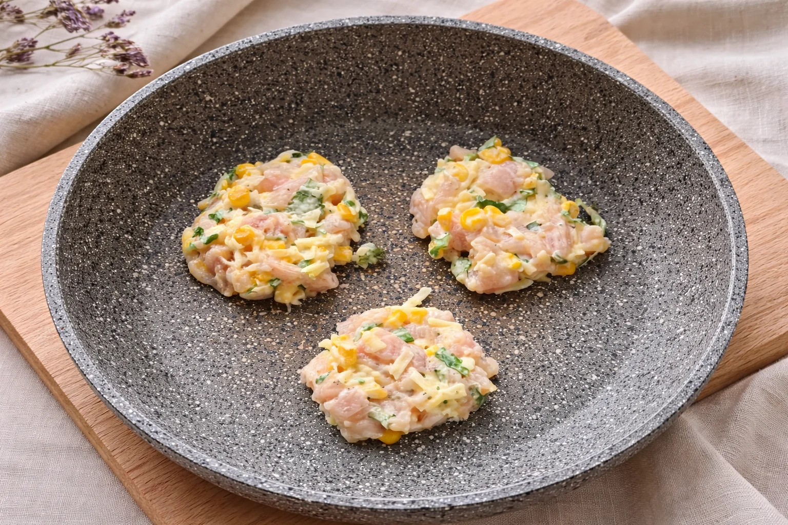 Fully combined chicken corn fritter mixture ready for shaping