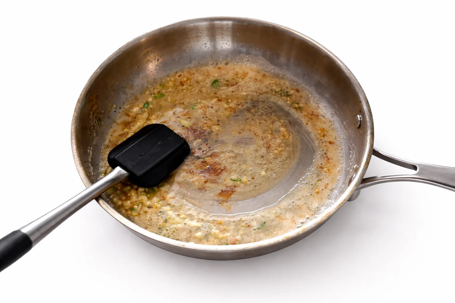 Honey garlic sauce simmering and thickening into glossy glaze