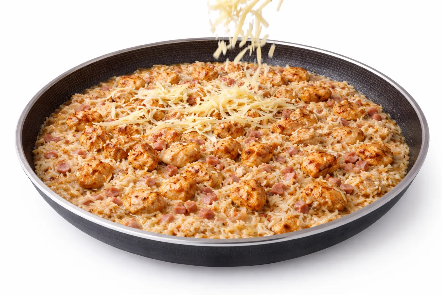 Cooked basmati rice and shredded cheddar added to creamy chicken and bacon skillet for final step