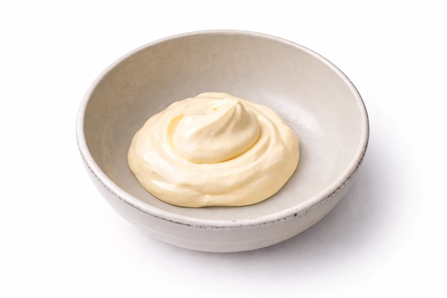 Light mayonnaise placed in a bowl as the base for homemade low calorie Cane’s sauce.