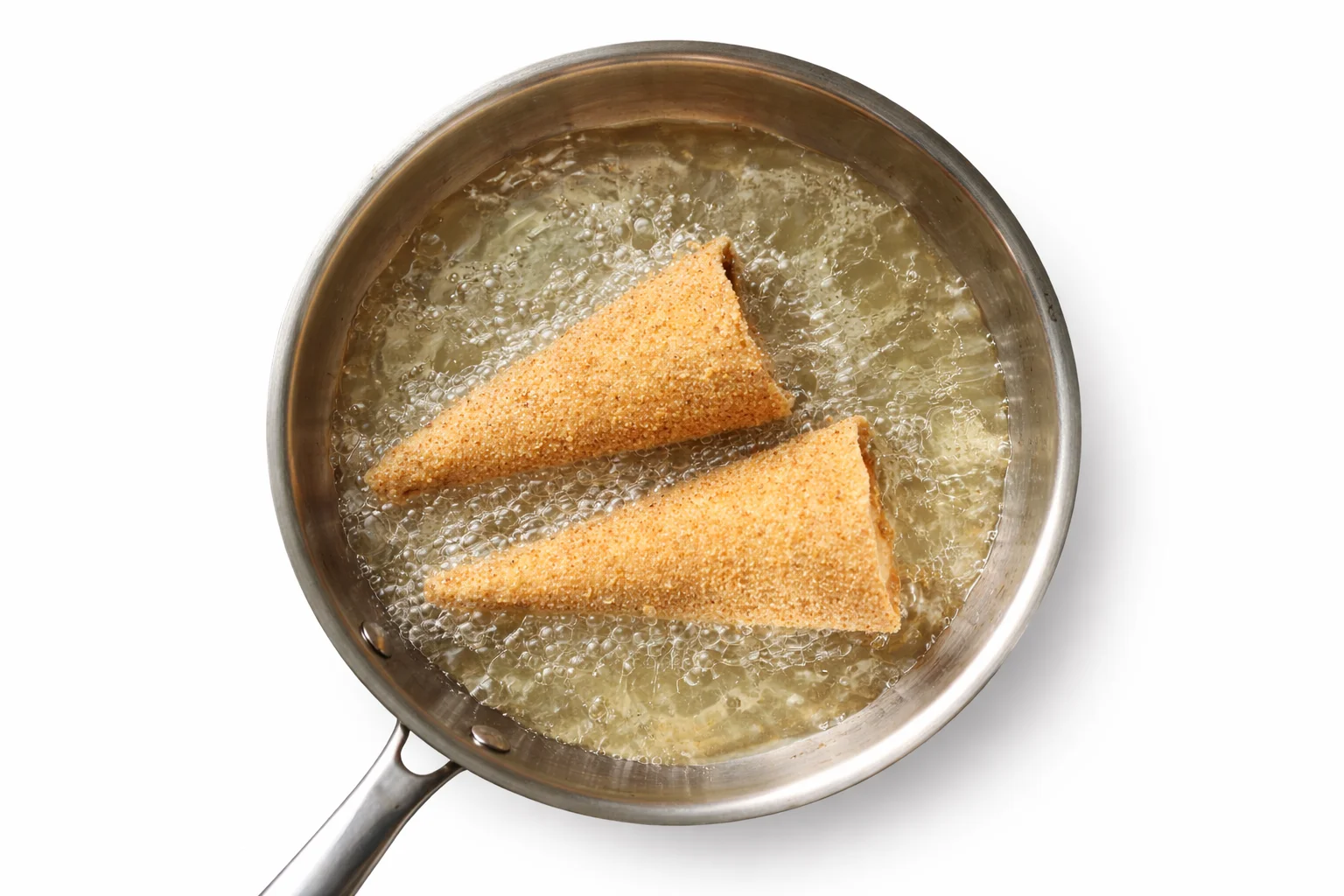 crispy tortilla cones frying until golden and crunchy