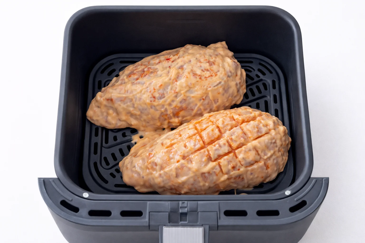 Chicken breast coated with sweet chili sauce in air fryer